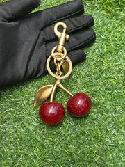 Coach cherry keychain
